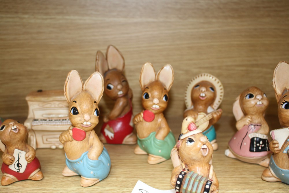 Eleven assorted Pendelfin rabbits and a piano